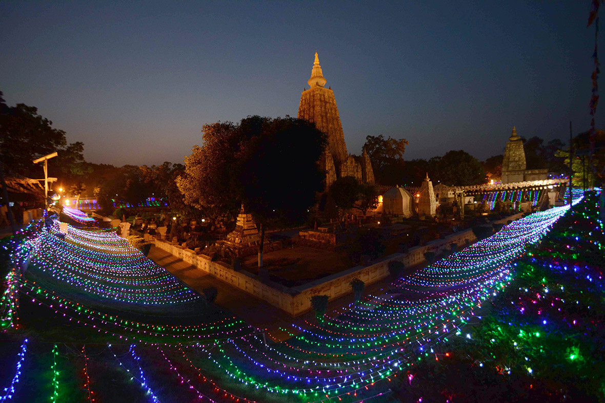 The Mahabodhi Temple at Bodhgaya in India is illuminated to celebrate the birthday of Lord Buddha