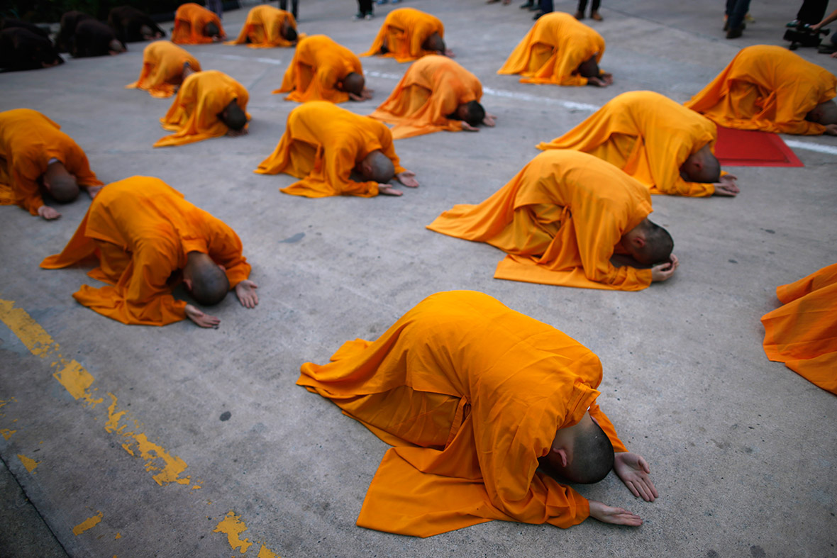 Buddhist monks perform the 