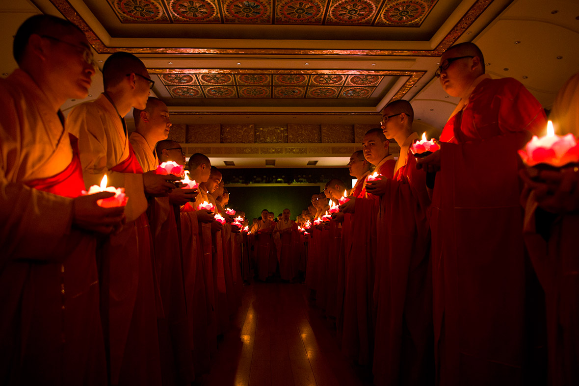 Monks take part in a ceremony to celebrate Buddha's birthday at the Yufo Temple in Shanghai