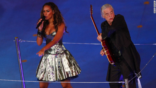 Leona Lewis performs with Page during the closing ceremony of the Beijing 2008 Olympics.