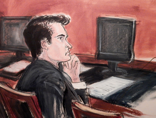 In this courtroom sketch, defendant Ross Ulbricht listens to proceedings from the defense table during opening arguments in his criminal trial in New York, Tuesday, Jan. 13, 2015. 