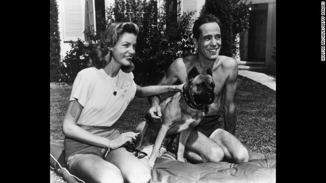 Bogart and Bacall at home with their dog in 1945.