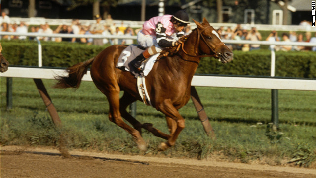 Jockey Steve Cauthen rides Affirmed to victory at the Belmont Stakes in 1978.
