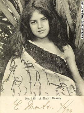 This card postmarked 1906 depicts a "Maori beauty" from the New Zealand town of Dunedin. 