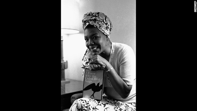 Angelou poses with her book "I Know Why the Caged Bird Sings" in 1971. It was the first in a series of autobiographical books.