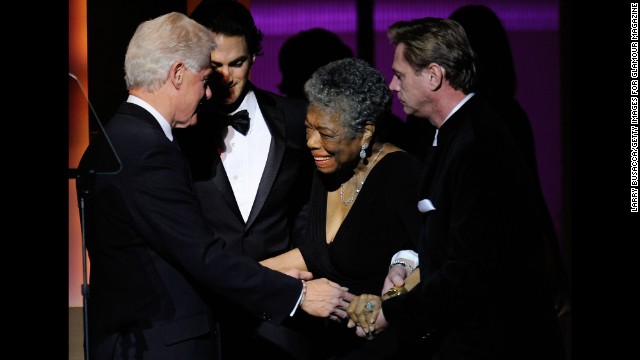 Clinton speaks to Angelou on stage at the the 2009 Women of the Year event hosted by Glamour magazine.