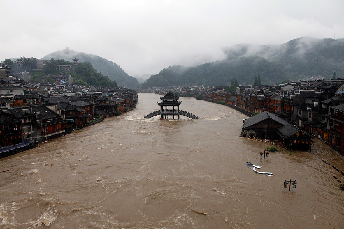 The ancient town of Fenghuang is partially submerged by floodwater as a river overflows in Hunan province, China.