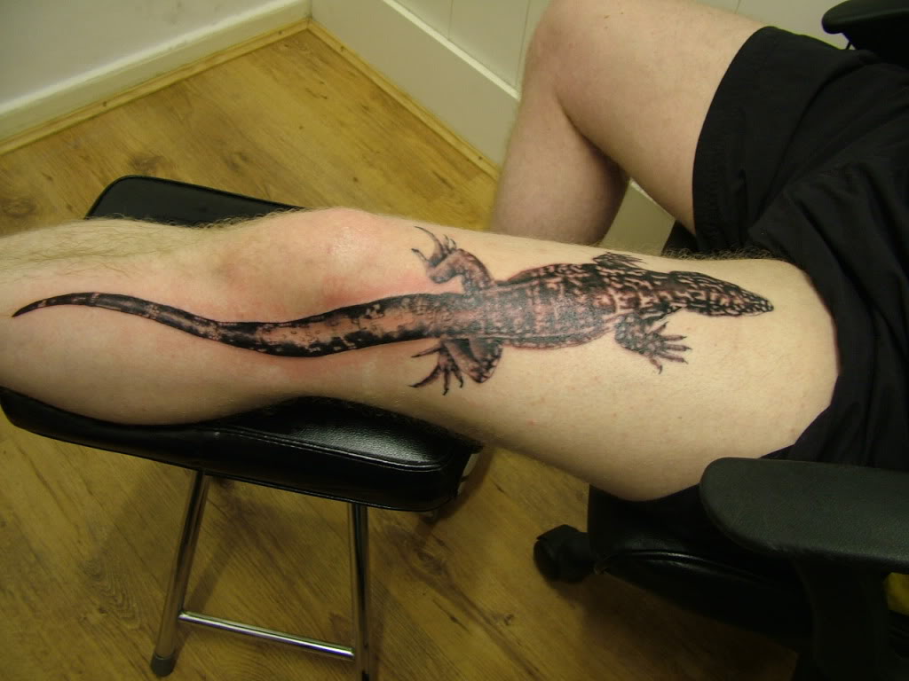 monitor lizard tattoo art on foot body