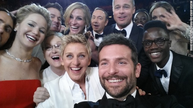 Pitt and Jolie (upper right) appear in a mass selfie with other movie stars during the Academy Awards in March.