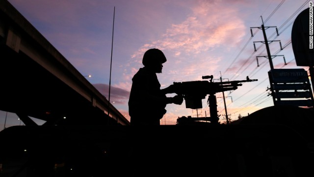 A soldier stands guard outside the Centre for the Administration of Peace and Order in Bangkok on May 20. 