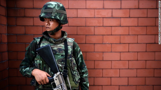 A soldier stands outside the Government Public Relations Department building on May 20.