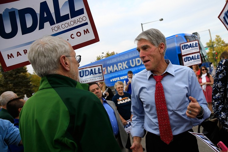 Democratic Sen. Mark Udall of Colorado, shown campaigning in Denver this month, has seen support from business PACs diminish in recent weeks, as those groups gave money to his Republican challenger, Rep. Cory Gardner.