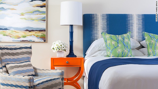 At The Break in Narragansett, Rhode Island, colorful hues highlight each of the 16 rooms, including coral-motif pillows and nightstands the color of tangerines that exude a mid-century vibe. 
