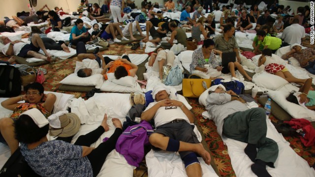 Tourists rest inside a shelter at a resort in Los Cabos on September 14.