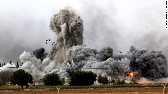 Smoke rises from Kobani on Sunday, October 12.