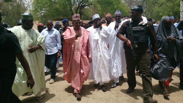Borno state governor Kashim Shettima, center, visits the Chibok school on April 21.