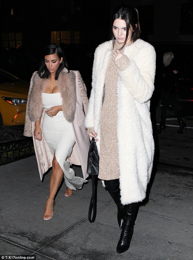 Walking tall: Kendall Jenner towered over sister Kim Kardashian while out to dinner with Khloe in NYC on Tuesday evening