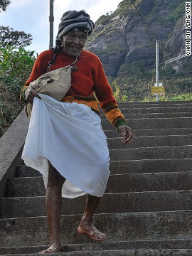 Many of the thousands of pilgrims who daily flock to Adam's Peak tackle the route barefoot.