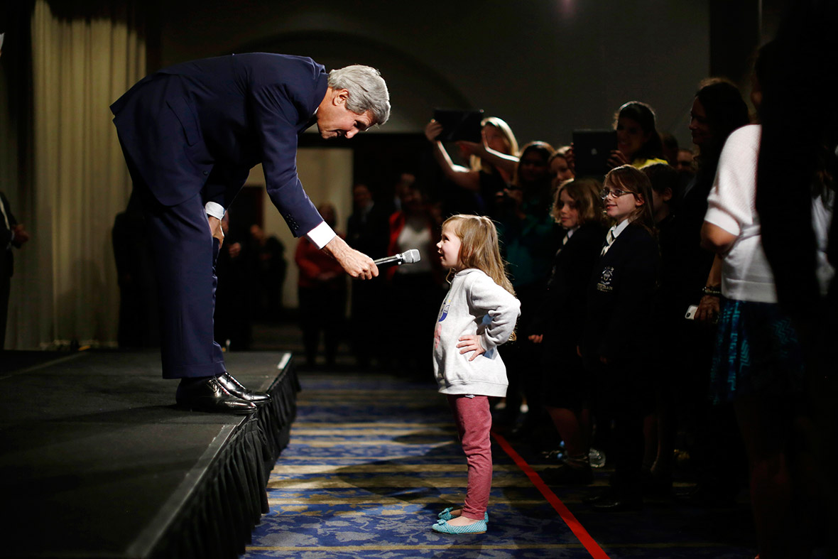 US Secretary of State John Kerry speaks with five-year-old Dara Edwards, the daughter of an American staffer at the US Consulate in Sydney, as he meets embassy and consular staff