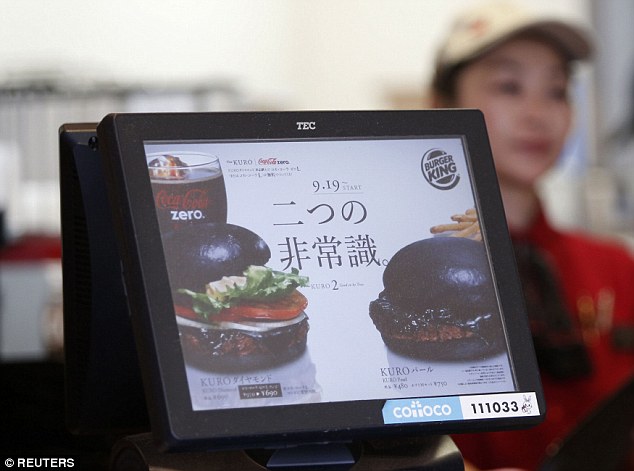 The Burger King black burgers come with salad in the Kuro Diamond or without in the Kuro Pearl