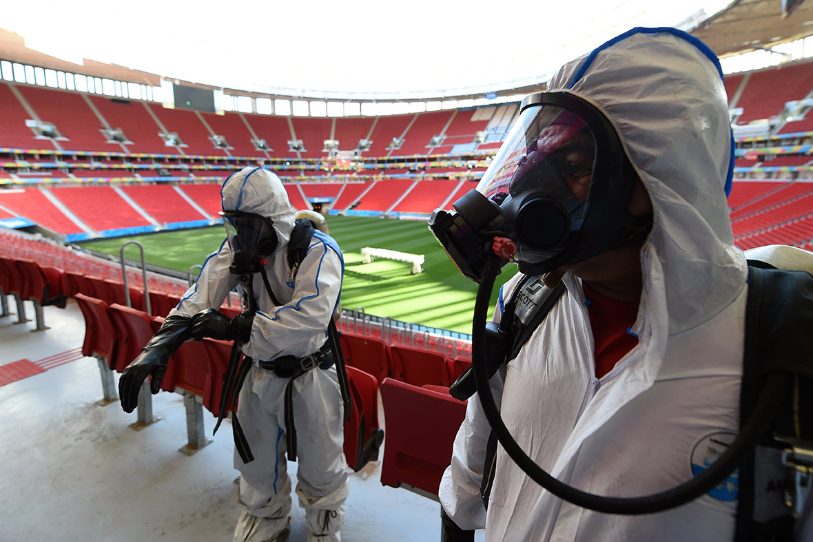 Brazilian Army soldiers take part in a simulated explosion of a radioactive device at Mane Garrincha National Stadium in Brasilia