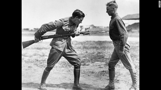 A British sergeant major instructs American soldiers in bayonet fighting at Texas' Camp Dick.