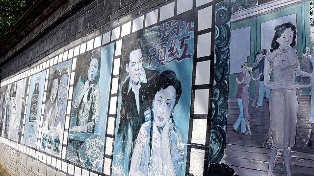 Numerous vintage posters decorate the walls in Anren's old town center. Buildings in the area feature well-preserved architecture and murals.