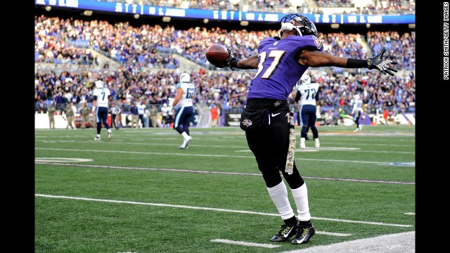Cornerback Danny Gorrer of the Baltimore Ravens celebrates an interception in the fourth quarter against the Tennessee Titans at M&T Bank Stadium in Baltimore, Maryland, on Sunday, November 9.