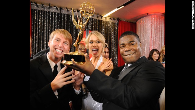 Members of the cast of "30 Rock" joke around with their award for outstanding comedy series backstage at the 60th Primetime Emmy Awards in Los Angeles on September 21, 2008. Morgan was also nominated for Outstanding Supporting Actor in a Comedy Series. 