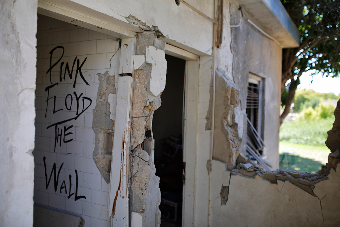 A residential structure damaged by a rocket fired by Palestinian militants in Gaza, is seen in Kibbutz Nahal Oz, Israel