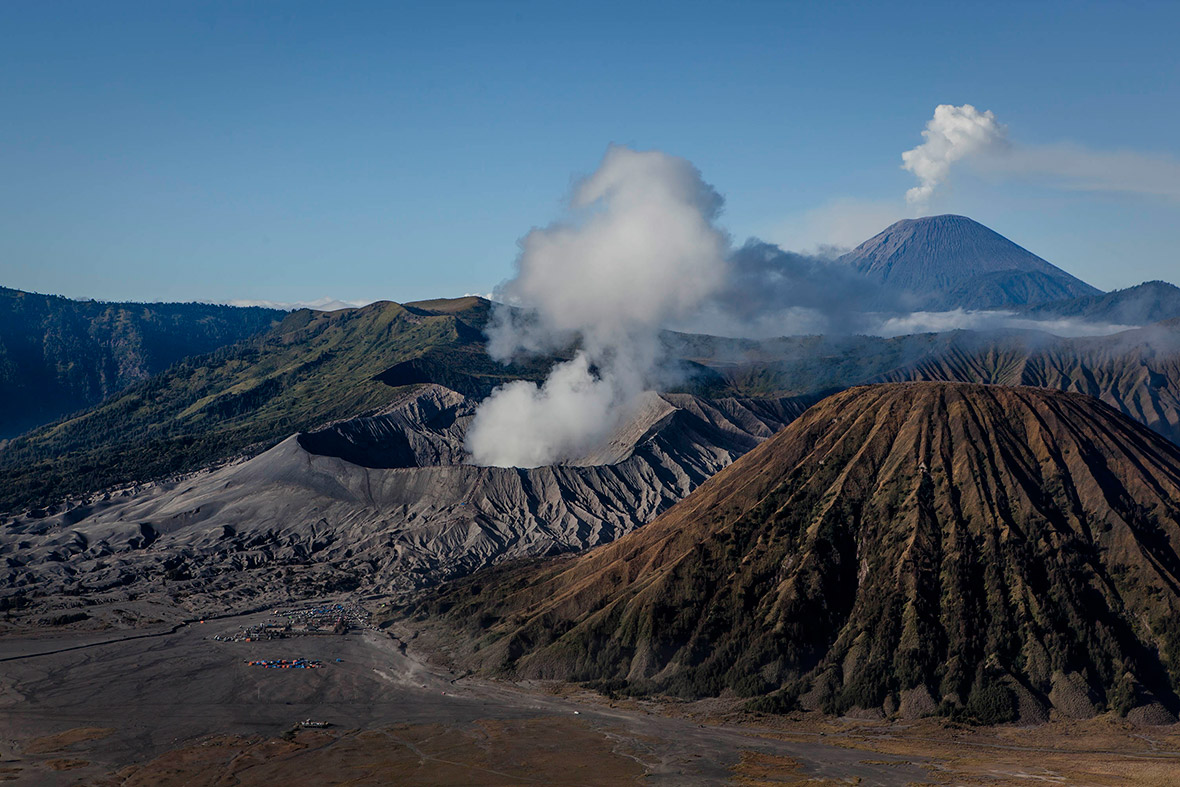 A village is seen at the foot of Mount Bromo in the Bromo Tengger Semeru National Park in Probolinggo, Java, Indonesia