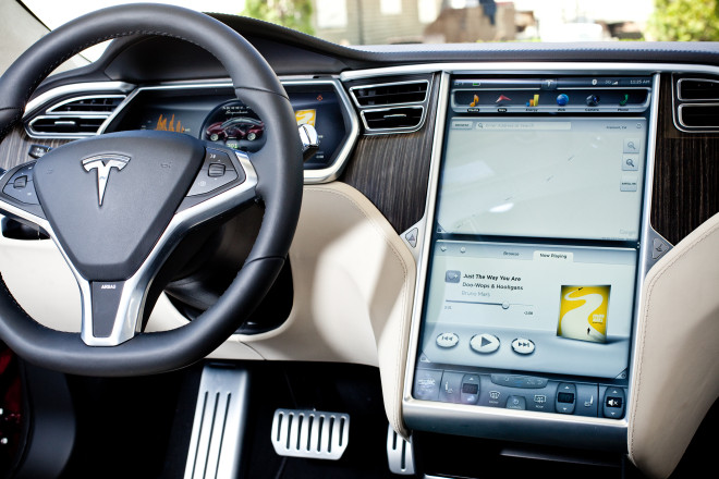How about putting some buttons and knobs in the new Tesla?