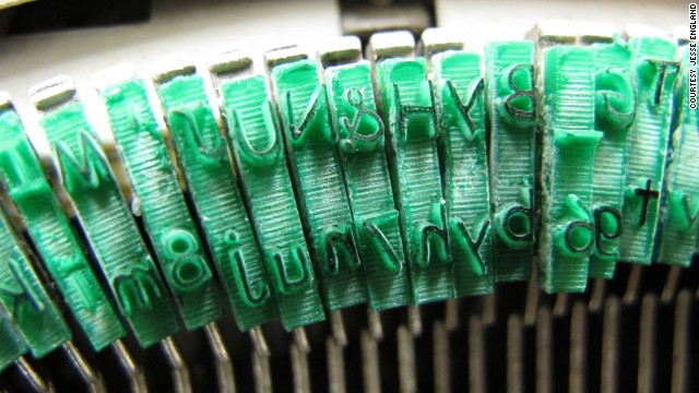 To create the "Sincerity Machine," England used a laser engraving machine to etch new letters out of acrylic, and glued them onto the strikers of a Sears-branded Brother Charger 11 typewriter.