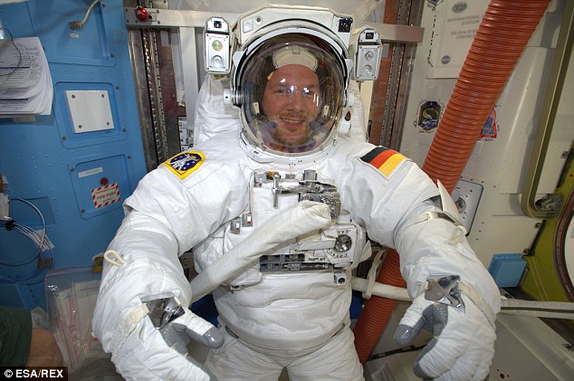 On Tuesday, American astronaut Reid Wiseman and German Mr Gerst  (pictured)worked together to move a broken pump into its proper storage location. During the six-hour, 13-minute spacewalk, Mr Gerst and Mr Wiseman worked outside the space station's Quest airlock