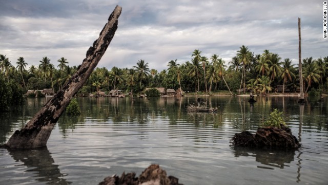 The village of Tebunginako was once a thriving harbor. Today, it lies under several meters of water. Dead coconut trees still emerge from the sea, a reminder of a time before saltwater contamination.