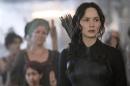 In this image released by Lionsgate, Jennifer Lawrence portrays Katniss Everdeen in a scene from "The Hunger Games: Mockingjay Part 1." (AP Photo/Lionsgate, Murray Close)