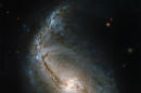 Hubble spots stellar nurseries in swirling spiral galaxy