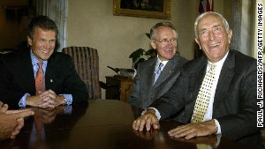 Tom Daschle, seated at left