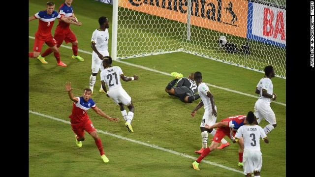 American defender John Brooks, bottom left, celebrates after scoring the winning goal against Ghana during a World Cup match Monday, June 16, in Natal, Brazil. The United States won 2-1 thanks to Brooks' header in the 86th minute.