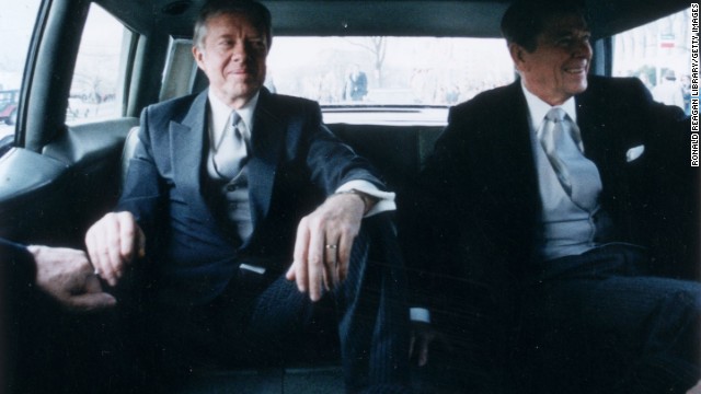 Outgoing President Carter, left, sits with President-elect Ronald Reagan en route to Reagan's inauguration in January 1981.