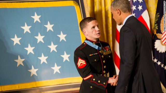 Retired Marine Cpl. Kyle Carpenter shakes hands with President Barack Obama as he receives the Medal of Honor on Thursday, June 19. While serving in Afghanistan, Carpenter used his body to shield a fellow Marine from a grenade blast on November 21, 2010. Click through to see other Afghanistan veterans who have received the Medal of Honor.