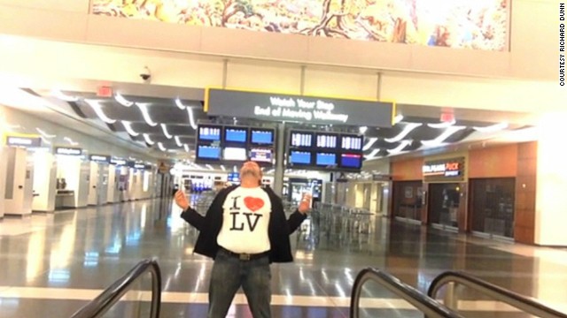 When stranded traveler Richard Dunn found himself stuck overnight at Las Vegas' McCarran International Airport, he passed the time by shooting a music video of himself lip-synching the Celine Dion cover of "All by Myself." iReporters shared their tips for how to pass time when stranded at the airport.