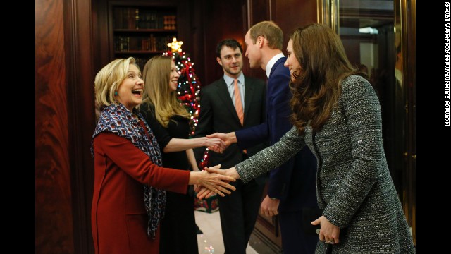 Hillary Clinton, Chelsea Clinton and Chelsea Clinton's husband, Marc Mezvinsky, greet the royal couple at the reception on December 8.