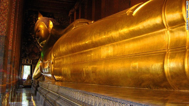Located in Bangkok Wat Pho temple complex, this reclining Buddha measures 15 meters high and 43 meters long. 