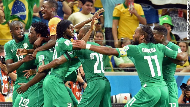 Ivory Coast's Wilfried Bony, second from left, celebrates with teammates after scoring a goal against Greece.