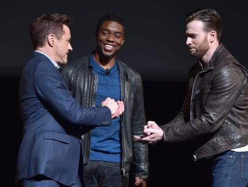 Chadwick Boseman (center) is introduced to the Marvel