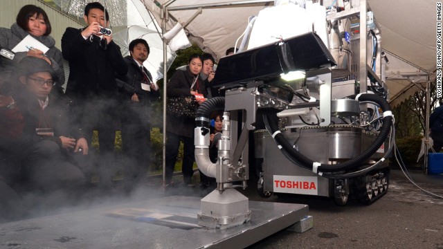 This Toshiba decontamination robot blasts dry ice particles against contaminated floors or walls and can be used to quickly and effectively clean up chemical spillages at nuclear plants. 