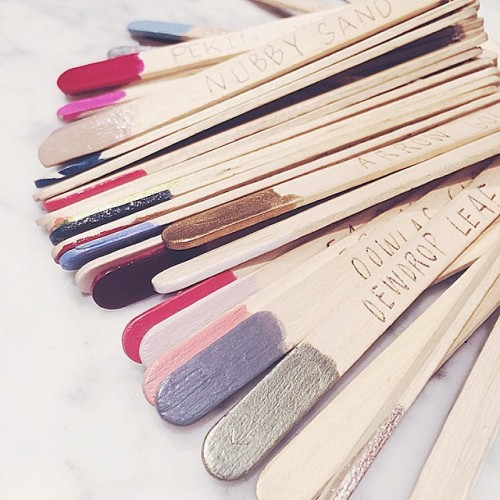 polished popsicle sticks to keep track of your colors 💅