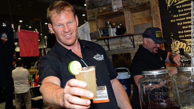 Shane McKnight served 'em up straight at the Ole Smoky Tennessee Moonshine booth at the Nightclub &amp; Bar Convention and Trade Show in Las Vegas. Now that's our kind of bartender.
