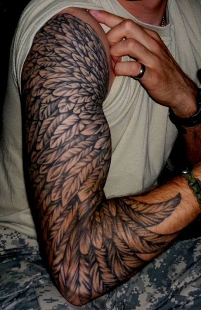 » Arm Tattoos » Shoulder tattoos » Realistic birds feather tattoo ...